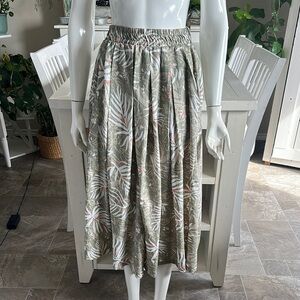 Vintage 1980s gaucho’s white stag skirts, pants, olive green floral pockets M/L